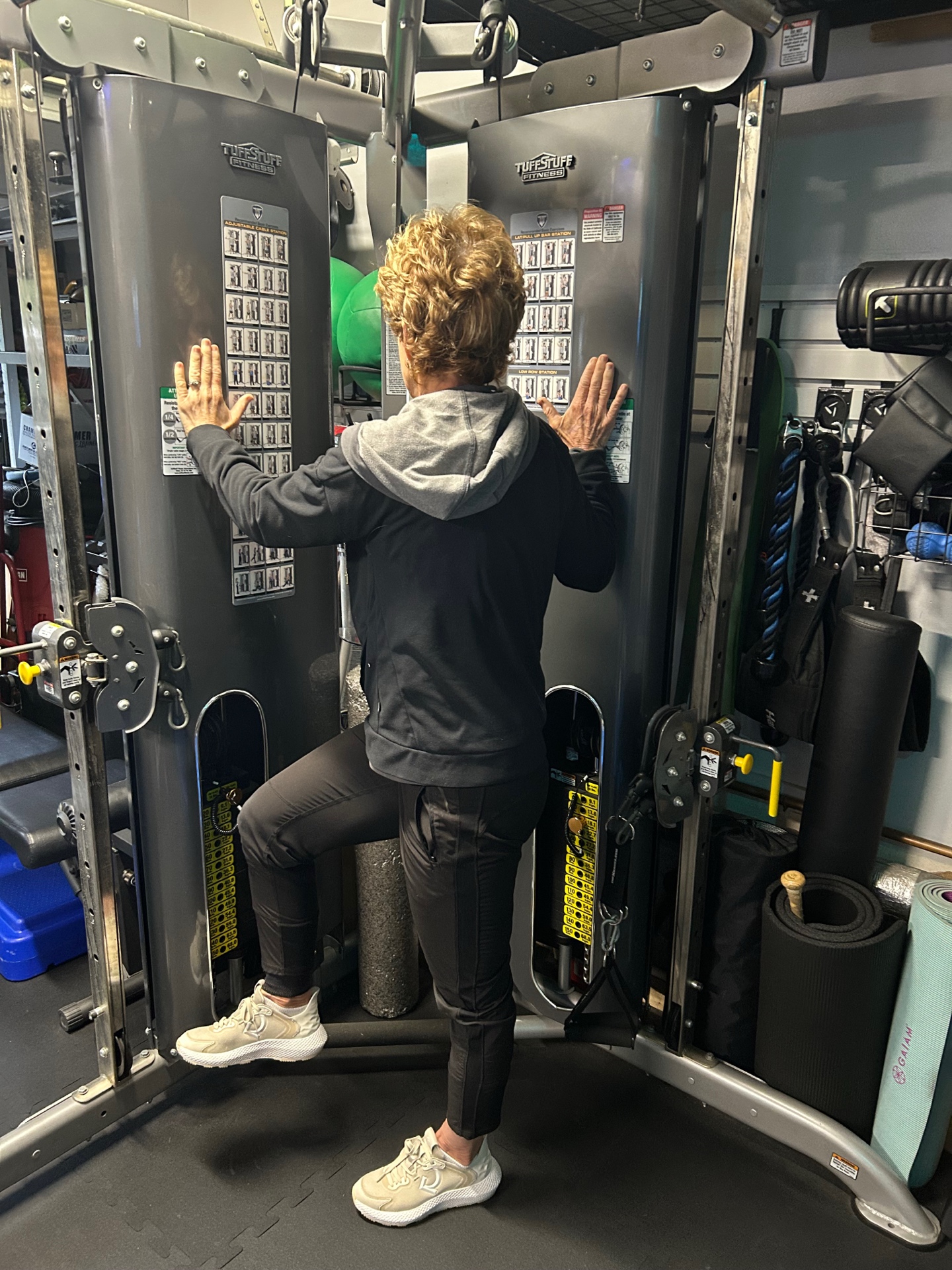 Adult client cable machine exercise